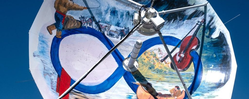 Satellite antennas like you have not seen them before – colorful artwork at Inuvik Satellite Station in Canada